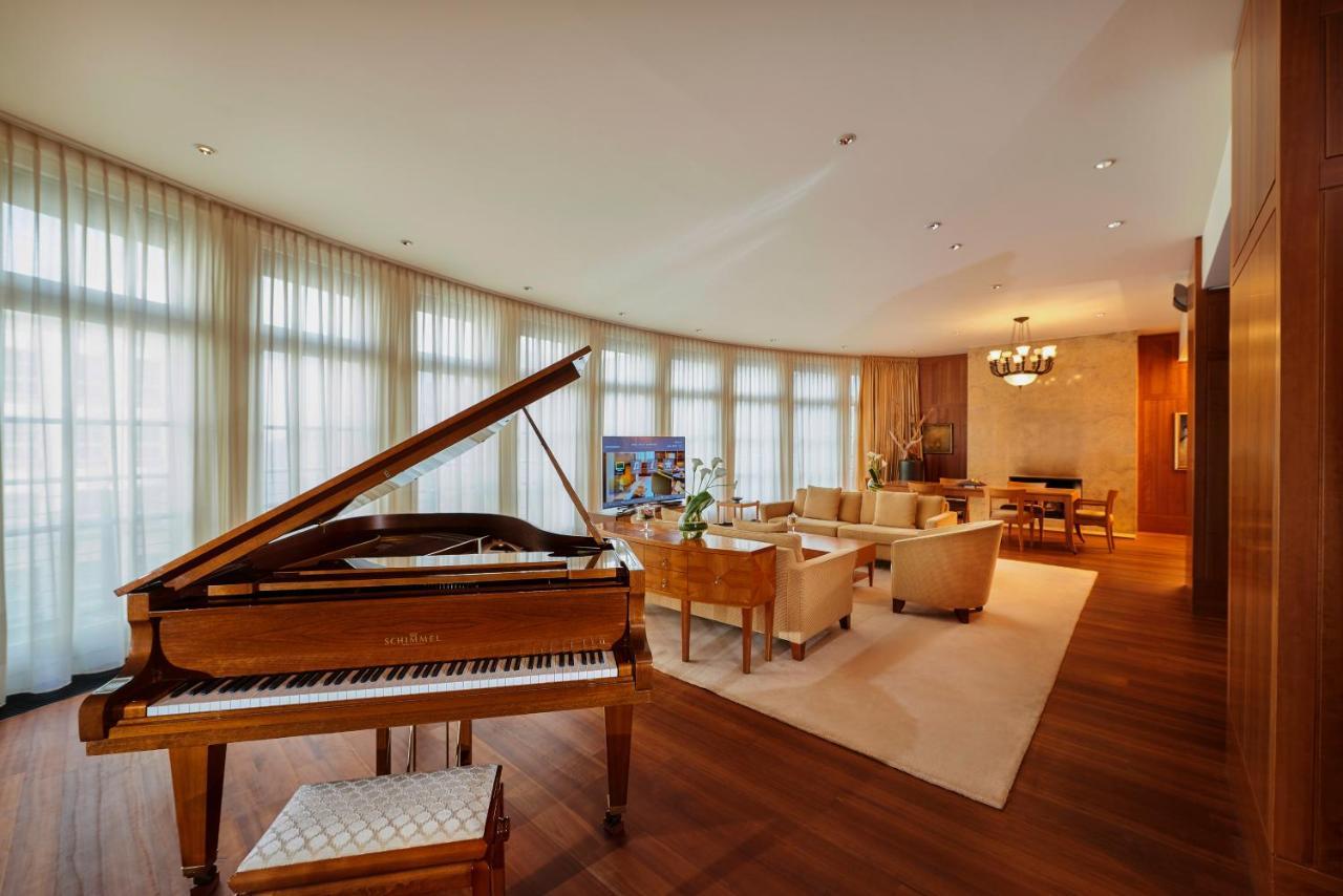 Conrad Hamburg Hotel Exterior photo A living room in a suite at the Mandarin Oriental, Munich